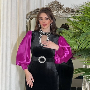 Elegant black velvet slim dress with purple satin lantern sleeves and rhinestone details