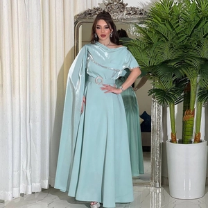 Elegant mint blue satin evening gown with asymmetrical shawl sleeve and jeweled belt