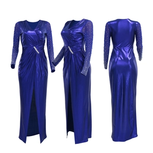 Detail of royal blue evening gown with crystal waist buckle and sheer beaded sleeves