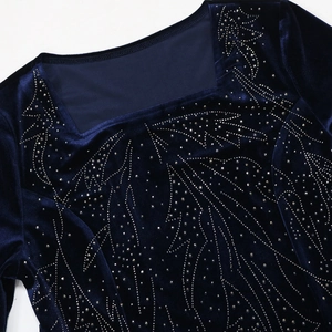 Detail of square neckline with rhinestones on dark blue velvet evening Jalabia dress