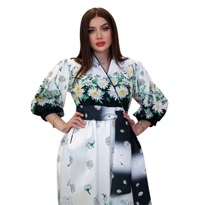 Women's white floral print maxi dress with V-neck, puff sleeves and a patterned waist belt