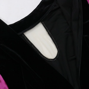Detailed macro shot of the velvet dress fabric texture with mesh lining and hidden zipper