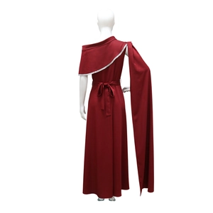 Detail of burgundy one-shoulder evening gown featuring silver sequin trim and waist tie