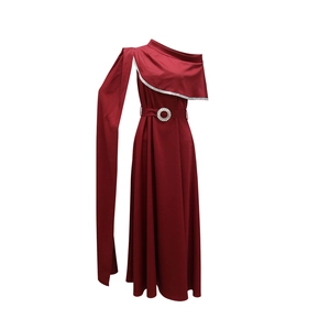 Detail of burgundy one-shoulder gown with sparkling trim and crystal waist buckle