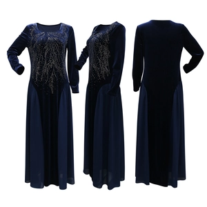 Detail of navy blue velvet and chiffon gown with intricate rhinestone leaf patterns