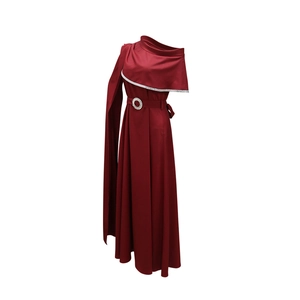 Detailed view of dark red one-shoulder evening gown with rhinestone cape and belt