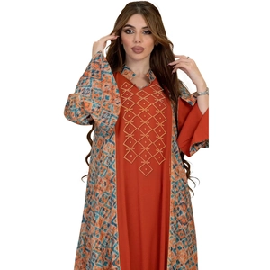 Detailed embroidery and beaded geometric pattern on an ethnic orange long robe for women