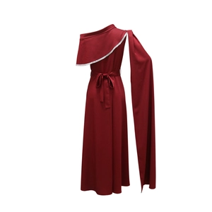 Detail view of burgundy one-shoulder dress showing sparkling sequin trim and waist tie