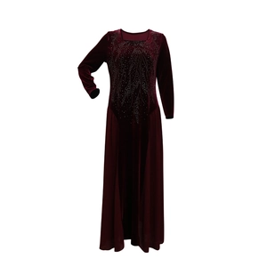 Detail of burgundy velvet dress featuring square neck and intricate silver rhinestone patterns