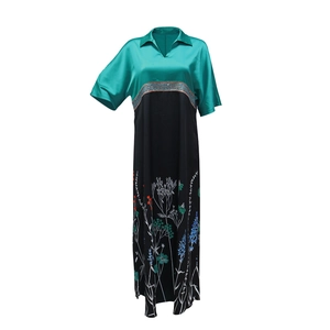 Close-up of contrast satin bodice and floral printed long dress with sequin trim