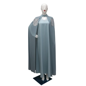 Detail of light blue-grey robe with silver tassels and sequins on the shoulder area