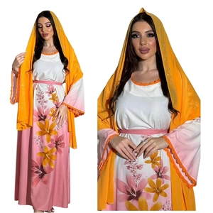 Detail of floral abaya with rhinestone patterns and vibrant orange lace trim on sleeves