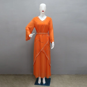 Detail of orange chiffon maxi dress with silver rhinestones and flared sleeves
