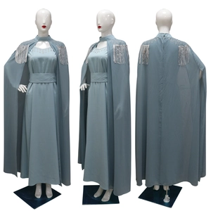 Detailed views of light blue sequined kaftan dress with silver tassels and beadwork