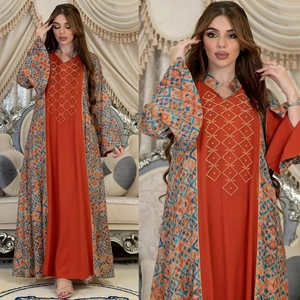 Ethnic kaftan maxi dress with orange beaded bodice and geometric printed long sleeves