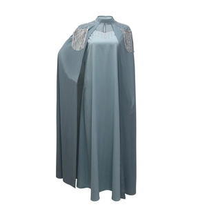 Detail of grey-blue robe with silver tassels and sparkling rhinestones on the shoulder