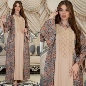 Ethnic abaya set with geometric orange-blue print, bell sleeves, and beaded embroidery