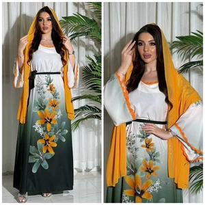 Elegant gradient Islamic dress with floral print and vibrant orange hijab wrap