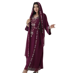 Detail of silver embroidery on dark purple abaya set with kaftan and matching hijab