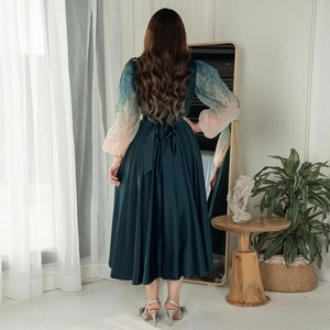 Elegant dark green satin jalabiya maxi dress with gradient sequined puff sleeves and back bow