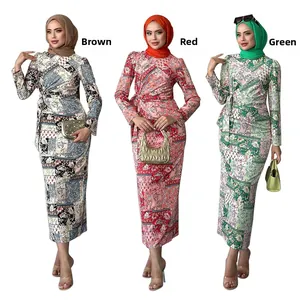 Detailed view of modest floral print dress with hijab in brown, red, and green colors