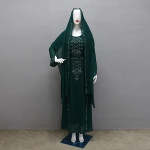Detail of silver rhinestone geometric patterns on dark green chiffon Muslim abaya set