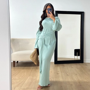 Elegant mint green long sleeve maxi dress with silver waist ring detail and drapes