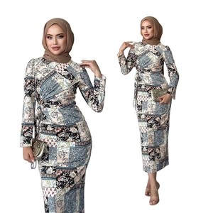 Elegant long-sleeved Muslim floral maxi dress with paisley prints and matching hijab