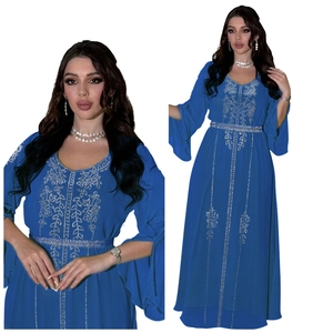 Detail of royal blue chiffon caftan with intricate silver embroidery and sequins