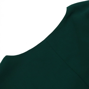 Detailed close-up showing fine texture and professional stitching of the dark green robe