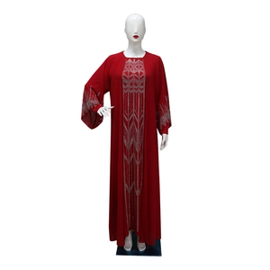Detail of silver geometric rhinestones on dark red chiffon abaya robe with belt