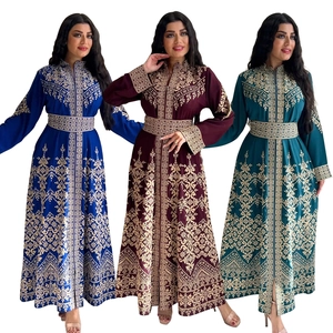 Detailed close-up of intricate embroidery patterns on three elegant Jalabiya dresses
