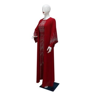 Detailed view of red Chiffon Abaya set with silver rhinestone patterns and belt detail