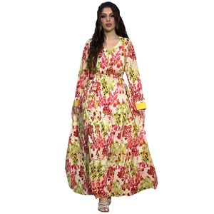 Close-up of floral print maxi dress featuring yellow piping and matching waist tie belt