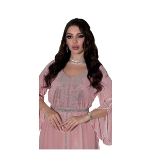 Detailed view of rhinestone embroidery on pink chiffon caftan with flared sleeves