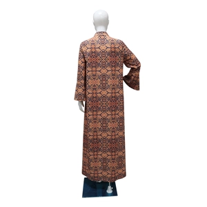 Rear view of ethnic long kaftan robe with geometric prints and rhinestone details