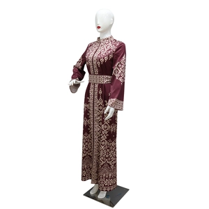 Close-up of ethnic print details on burgundy Jalabiya long sleeve maxi dress