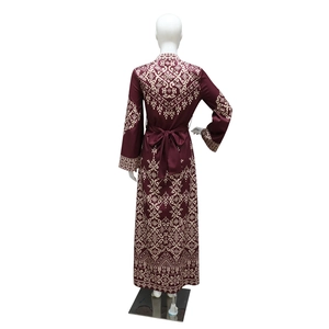 Rear view of dark red Jalabiya long sleeve dress with intricate beige ethnic prints