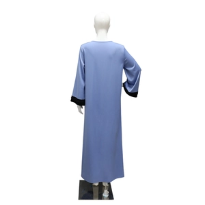 Back view of a light blue velvet maxi dress with black lace cuffs on white mannequin