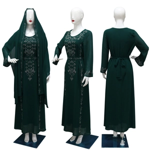 Three-way view of a dark green long dress with silver rhinestones and matching hijab
