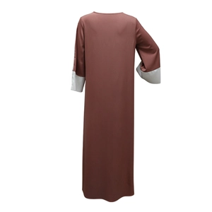 Detail of satin contrast maxi dress with grey patchwork cuffs and red-brown fabric