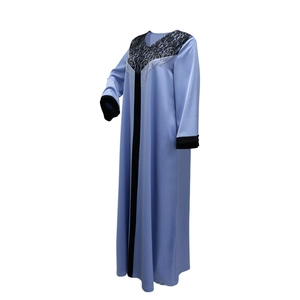 Detailed lace collar with wavy rhinestones and velvet cuffs on a lilac satin dress