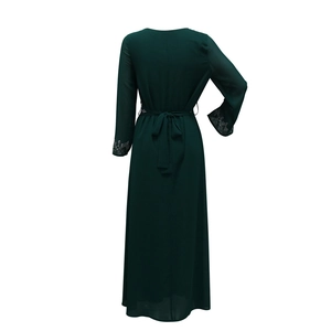 Rear view of long sleeve dark green robe with silver rhinestone waist and cuff details