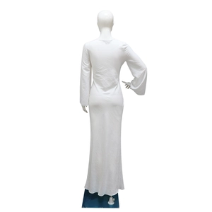 Rear view of white floor-length long sleeve maxi dress with minimalist slim fit design
