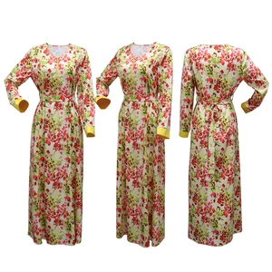 Three views showing floral print long dress with V-neck, waist belt and long sleeves