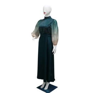 Detailed view of rhinestone embellishments on gradient puff sleeves of this jalabiya dress