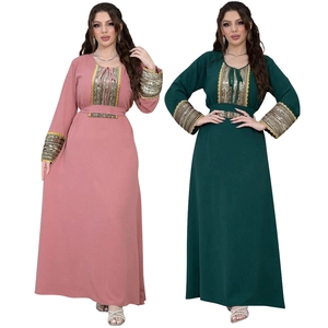 Detailed embroidery and gold sequins on the neckline and cuffs of long jalabiya gowns