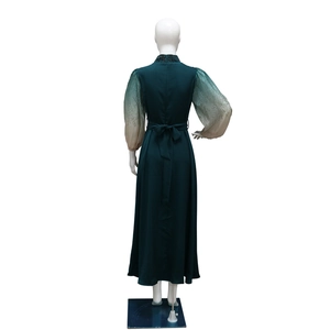 Rear view of jalabiya evening dress with gradient bubble sleeves and rhinestone details