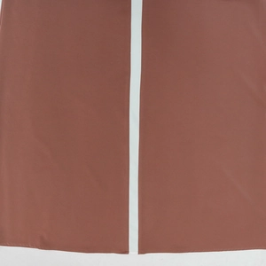 Detailed view of satin contrast panel and white stripe on maroon sequin maxi dress
