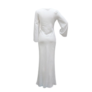 Back view of elegant white maxi dress featuring V-neck and flared long sleeves detail
